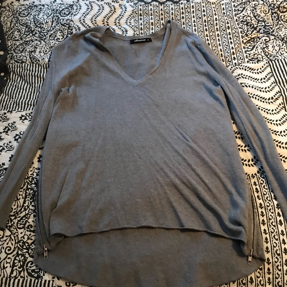 Grey V neck sweater, zippers on the side
